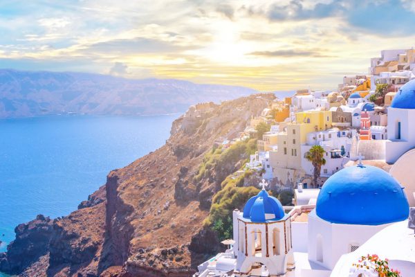 Beautiful Oia town on Santorini island, Greece. Traditional whit luxury yachting area greece